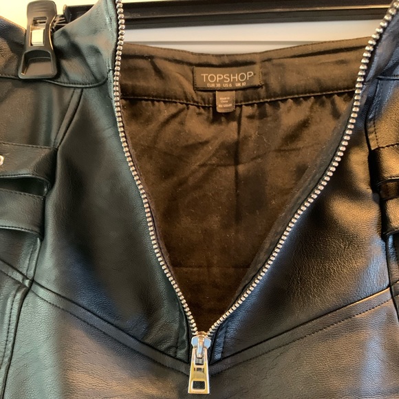 Black “leather” skirt with silver buckling - Picture 6 of 6